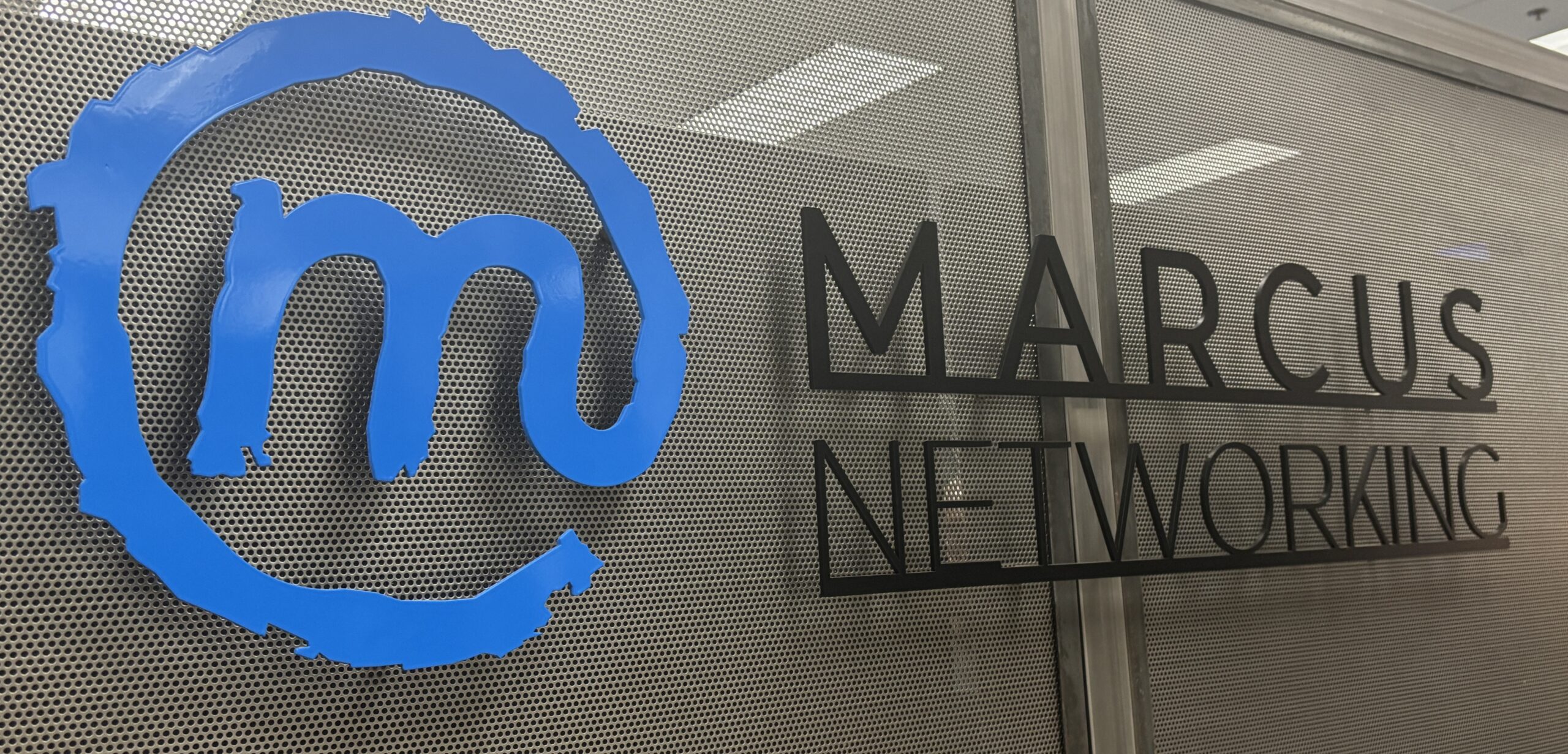 Marcus Networking signage at the Tempe office